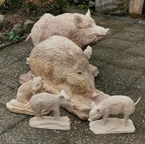 wildschwein liegende bache keiler holz schnitzen motorsge kettensge 