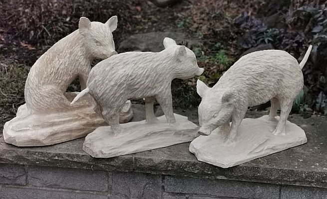 wildschwein frischlinge liegende bache  holz schnitzen motorsge kettensge 